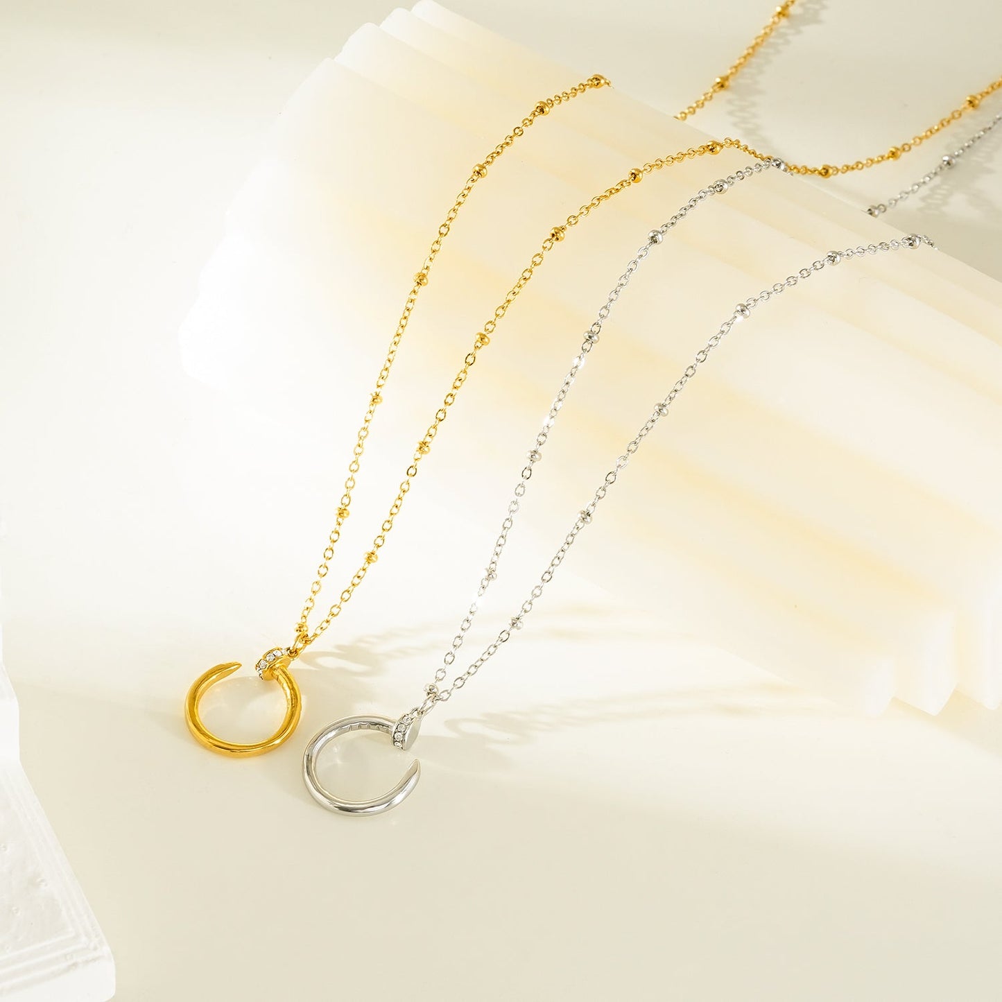 CSENGE Silver (White Gold) Necklace: Zirconia Embedded Circular Nail Pendant on a Satellite Beaded Chain