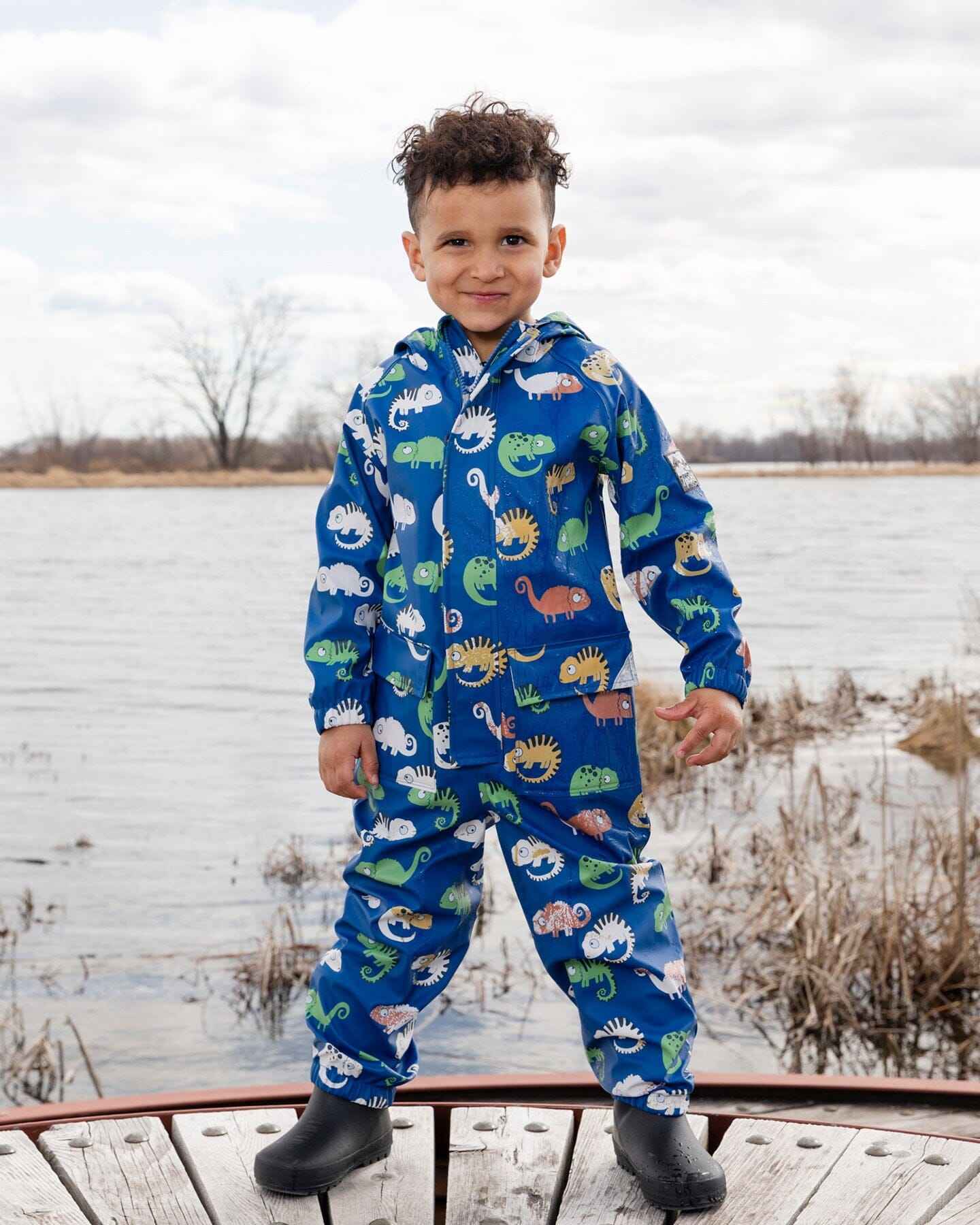 Blue rain jumpsuit with color-changing chameleon print