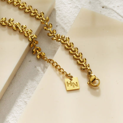 MAGDA Gold: Leafy Patterned Bold Bracelet