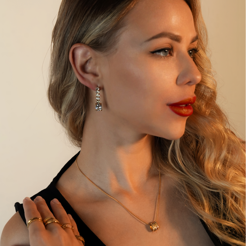 MALIA: Radiant Cascading Zirconia Drop Earrings