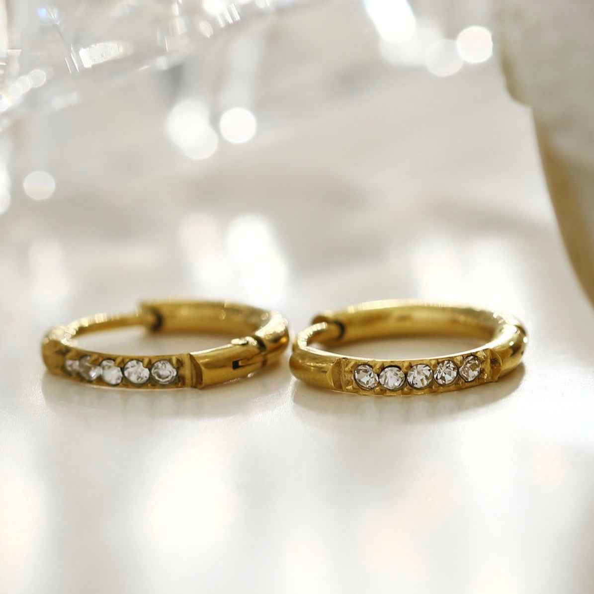 DARCI: Pavé Zirconia Gemstone Embedded Classic Mini Hoop in Gold