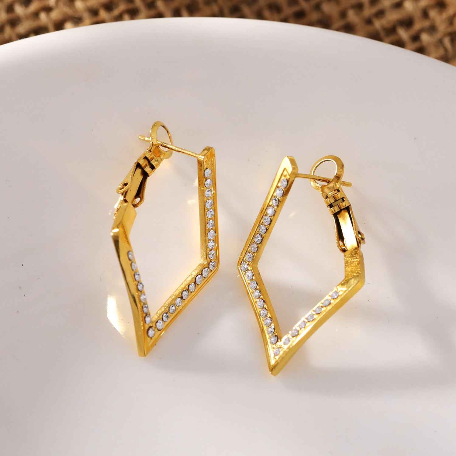 ALMA: Twisted Diamond Shaped Hoop Earrings Embedded with Zirconia Gemstones